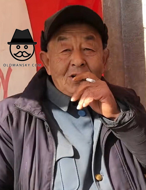 Old man wore a hat smoke in the street