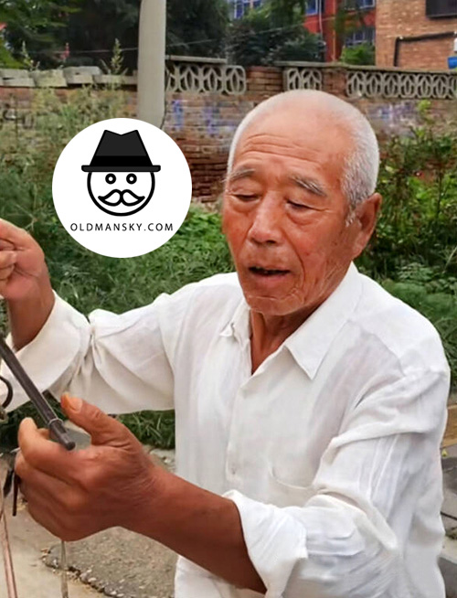 White hair old man in white shirt sold pumpkin