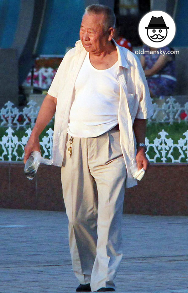 Old man wore white clothes walked around on the square - OLDMANSKY