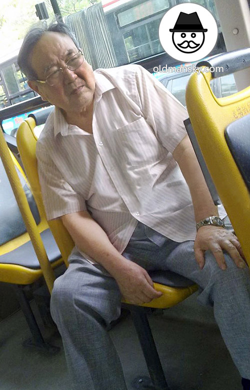 Glasses old daddy wore gray trousers by bus