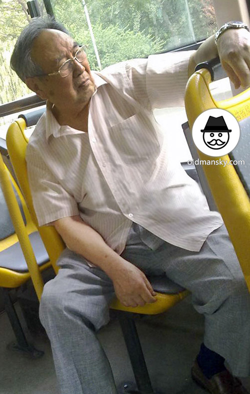 Glasses old daddy wore gray trousers by bus