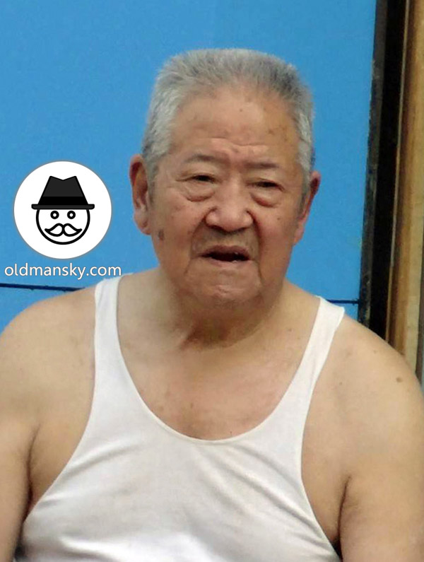 Grey hair old man wore white vest undershirt with his old friend in the street