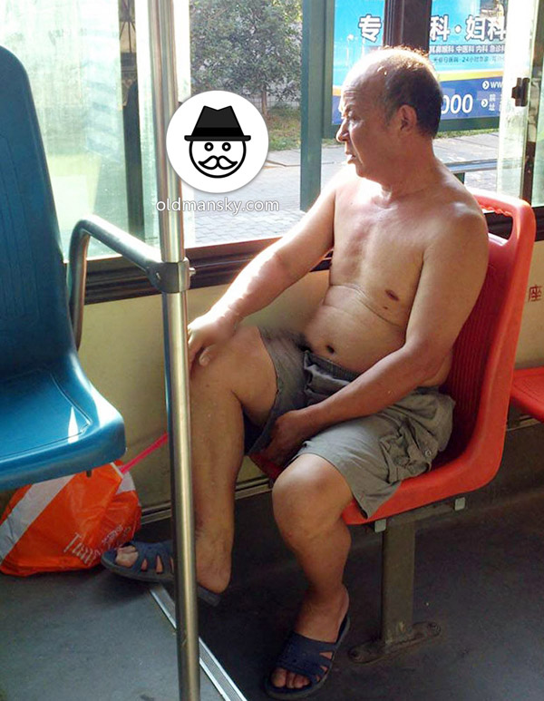 Two grey middle pants old men one by bus and other writing_06