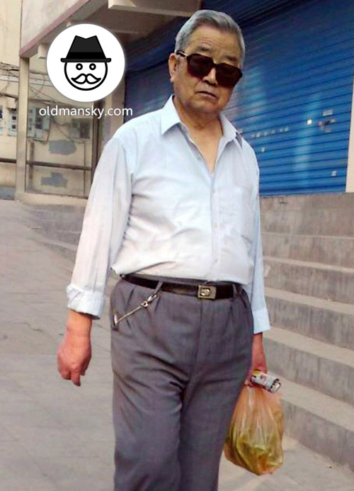Sunglasses silver hair old man wore white shirt and blue trousers went ...