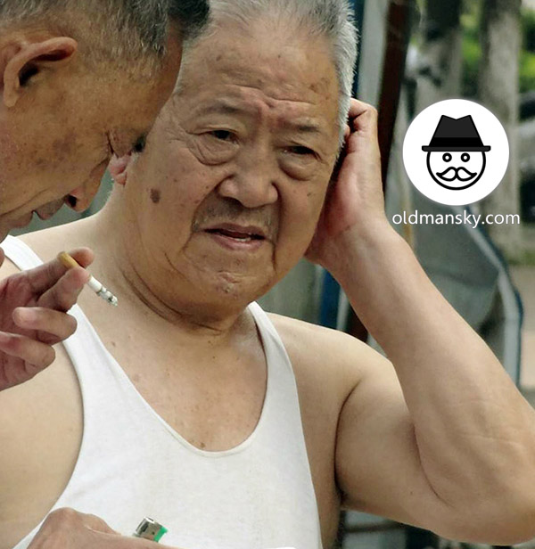 Grey hair old man wore white vest undershirt with his old friend in the street_06