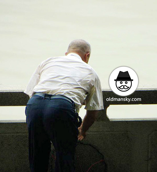 Old daddy wore white shirt was talking with his friend by the river