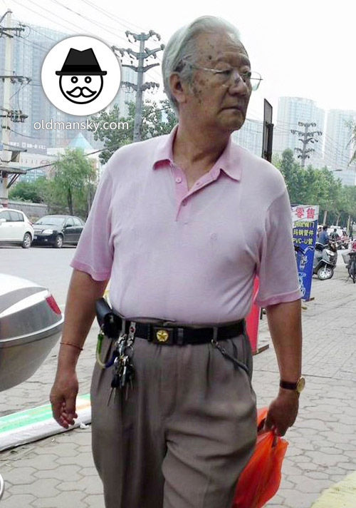 White hair glasses old man wore white polo shirt walked in the street_04