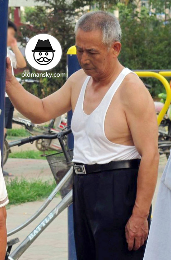 Old daddy wore white vest undershirt and brown trousers exercised_04