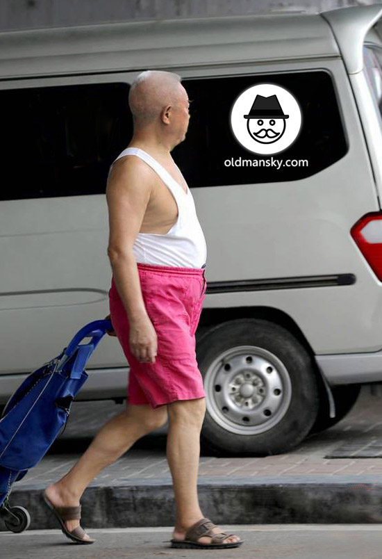 White short hair old man wore red pants and white vest undershirt went shopping