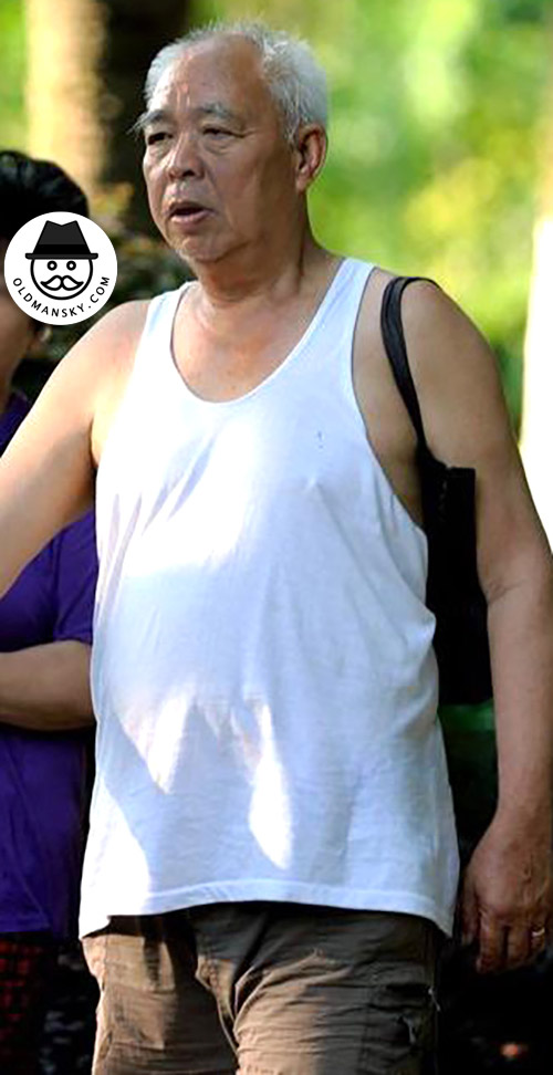 Three old men wore white vest undershirt did exercise in the park_05