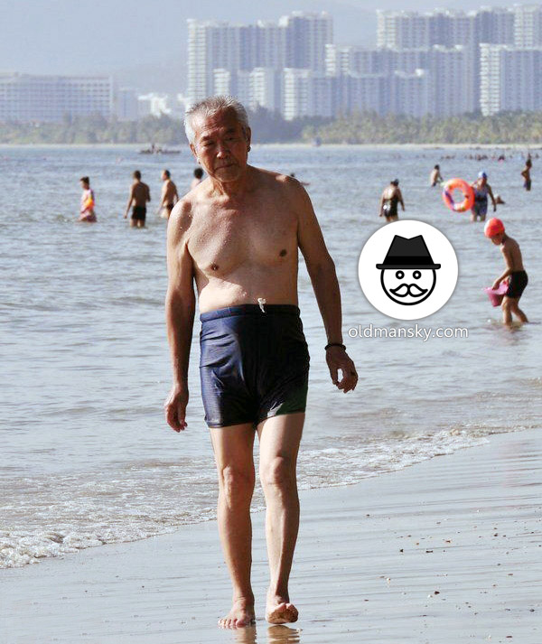 Swimming old daddy was walking on the beach